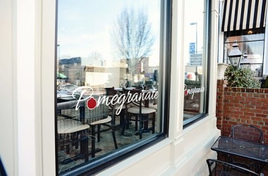 Pomegranate storefront sign